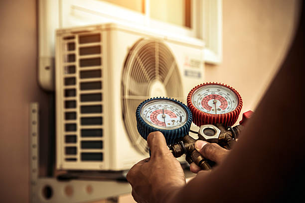Professional Air Conditioning Service technician working in Pitsburg, OH